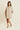 ALIZÉE - Robe courte beige unie à volants